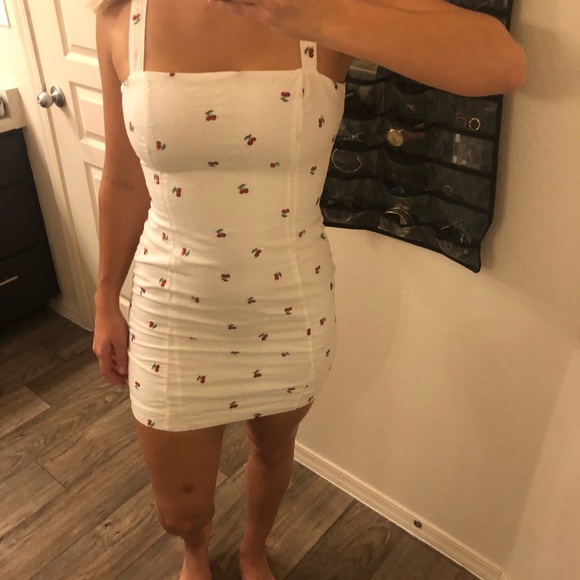 white dress with cherry print